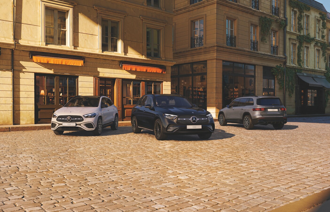 A group of cars parked in front of a building
