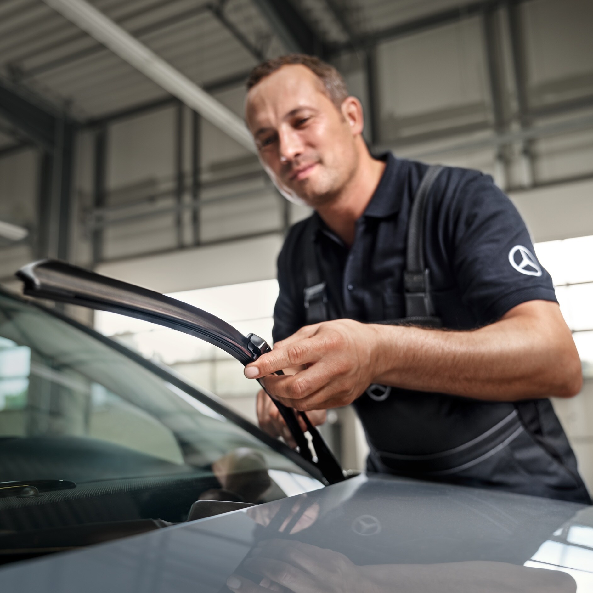 Mercedes-Benz genuine windscreen wipers A Mercedes-Benz technician changes the windscreen wipers on the vehicle.